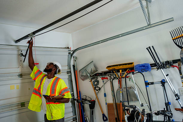 Professional Garage Door Panel Replacement technician working in Muskogee County County, OK
